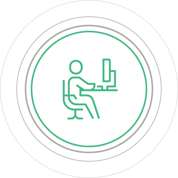 Icon of person sitting at computer desk